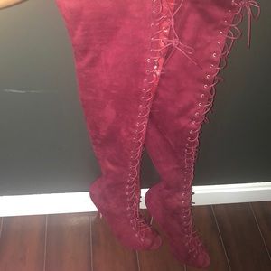 Size 10 burgundy over the knee high heels.